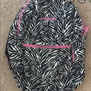 ISO Fuzzy leopard or zebra print jansport backpack